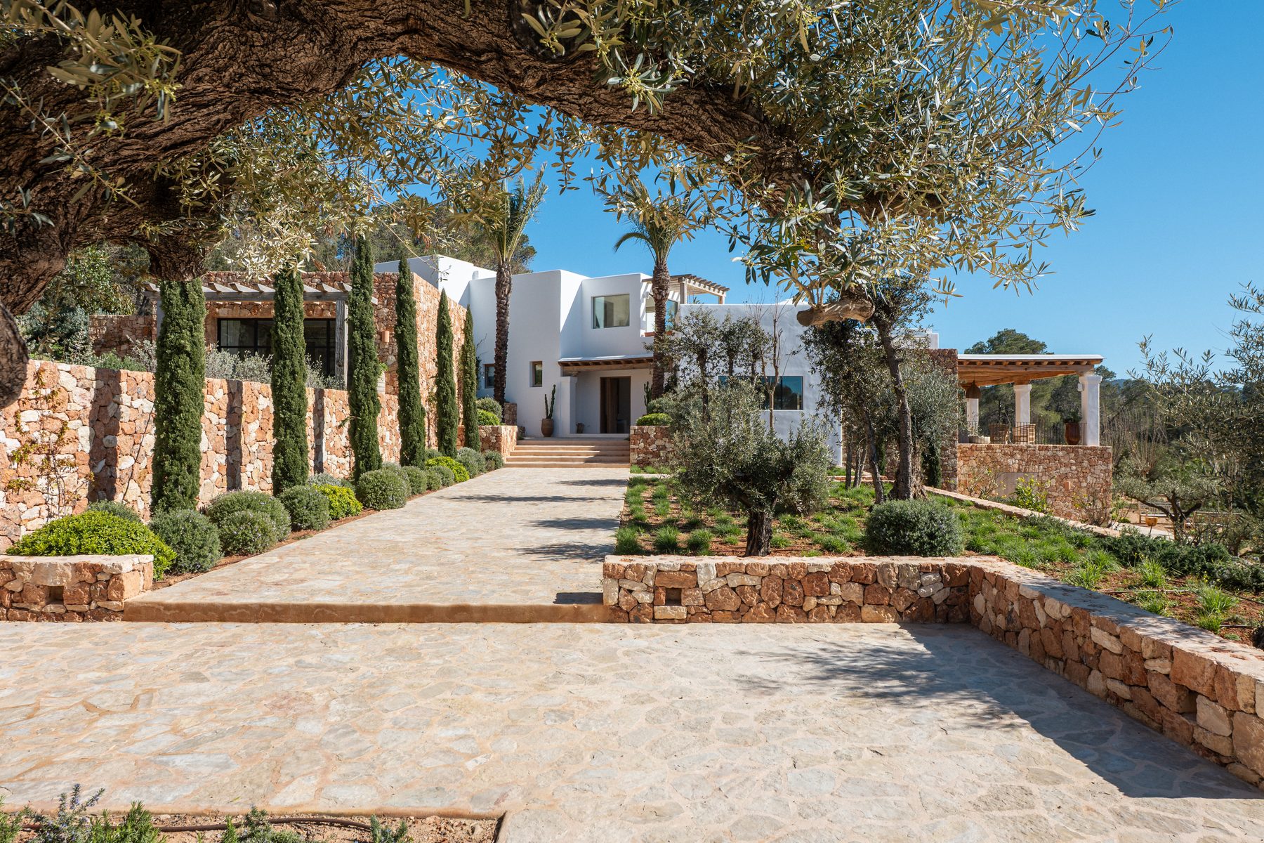 Modern glass villa interior with sea view in Ibiza