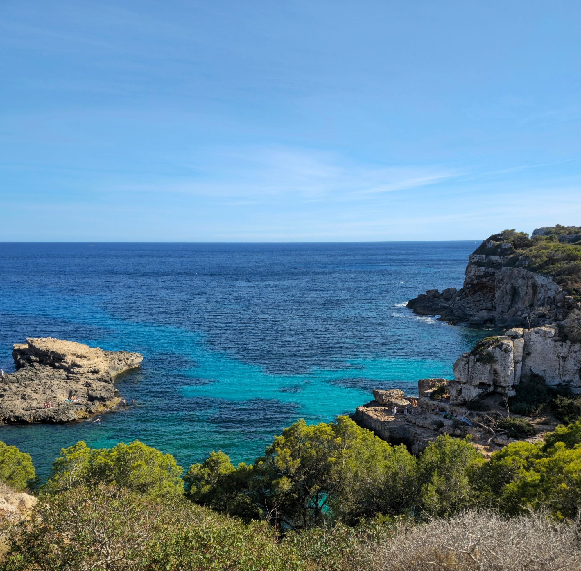 Turquoise Ibiza cove and rocks