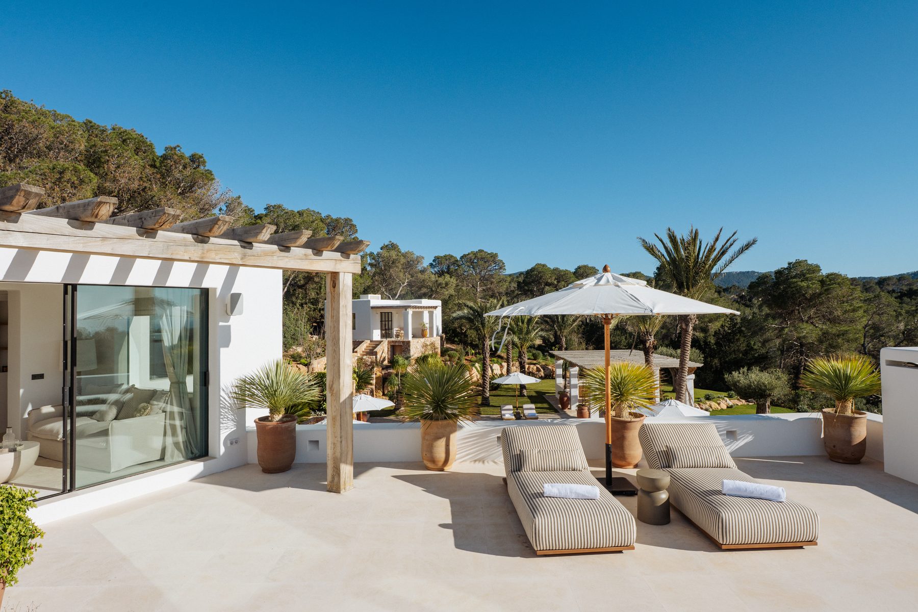 Terrace and pool of a home for sale in Ibiza